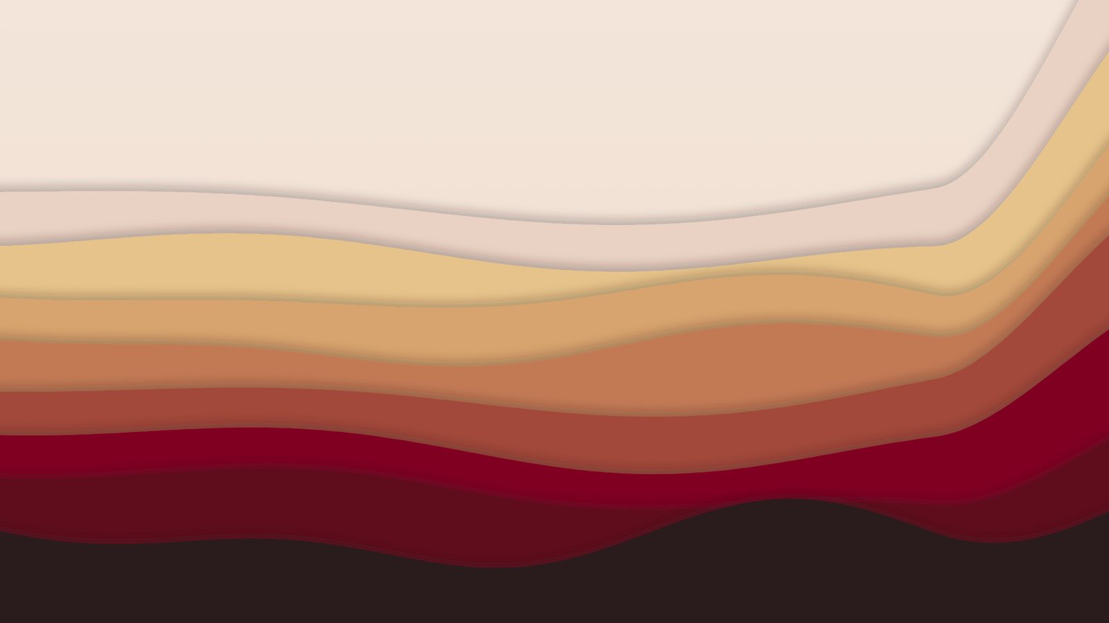 Soft layers of earth in blush, gold and crimson under a pale sky